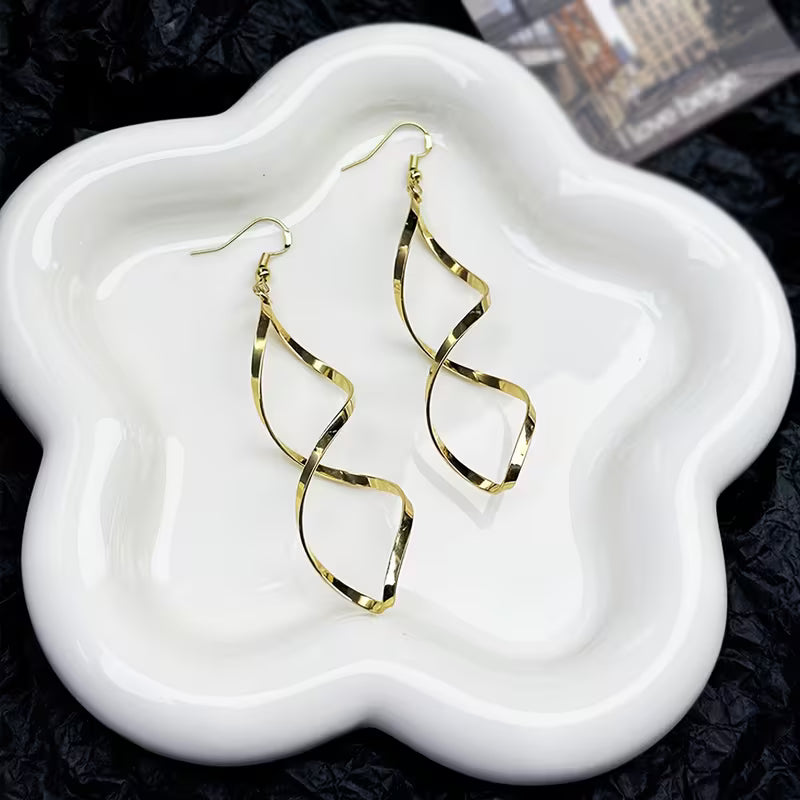 <p>Aretes Colgantes Espirales | Oro</p>