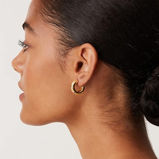 <p>Aretes en forma de aro Stardust | Oro</p>