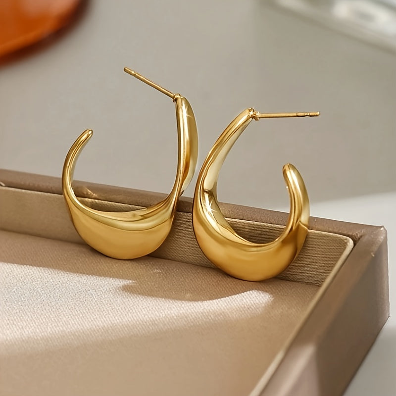 <p>Aretes en forma de media luna tallados | Oro</p>