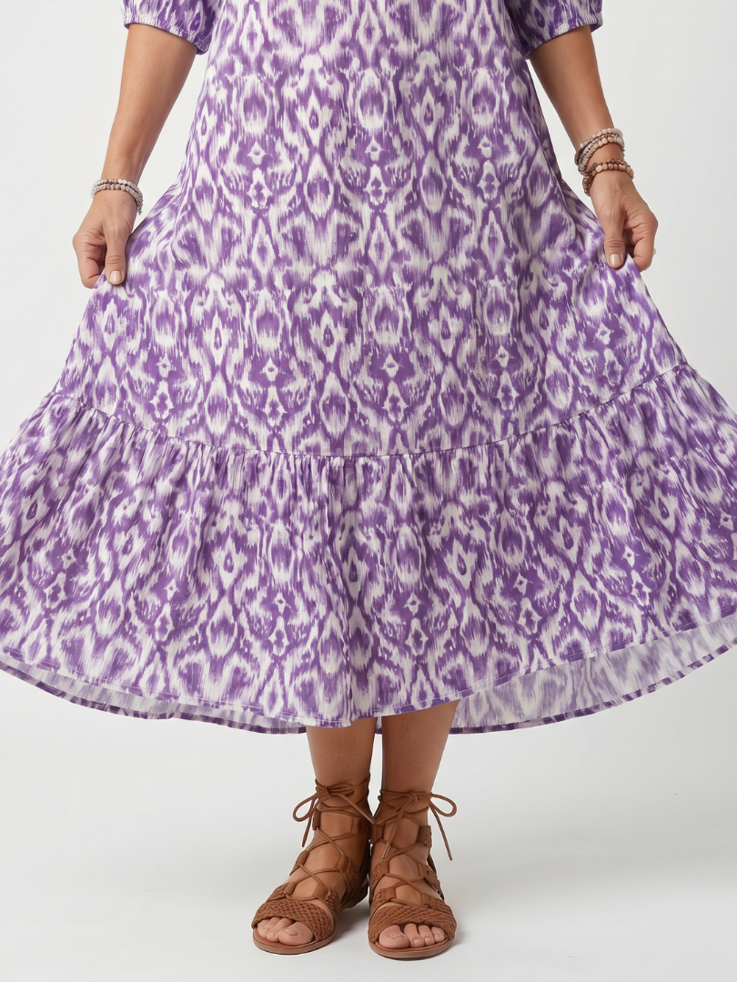 Penelope | Vestido Midi Estampado con Cuello de Borlas