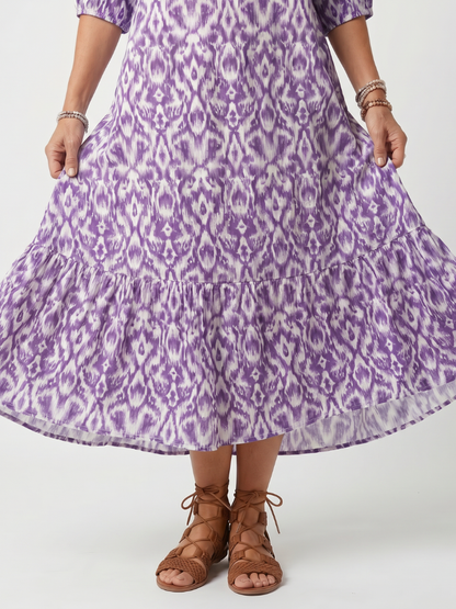 Penelope | Vestido Midi Estampado con Cuello de Borlas