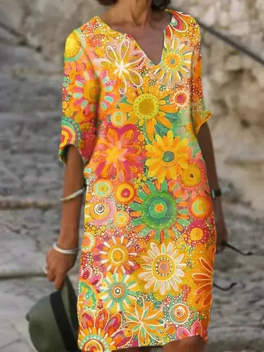 Nira | Vestido midi con flores vibrantes