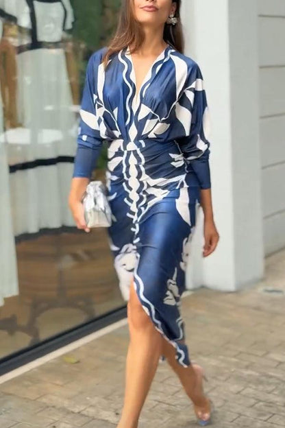 Eva | Vestido midi con mangas dolman en un diseño único