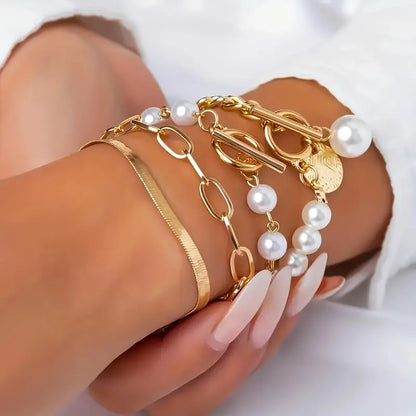 <strong>Conjunto de 4 Pulseras Chic - Serpiente, Perlas y Eslabones | Oro</strong>