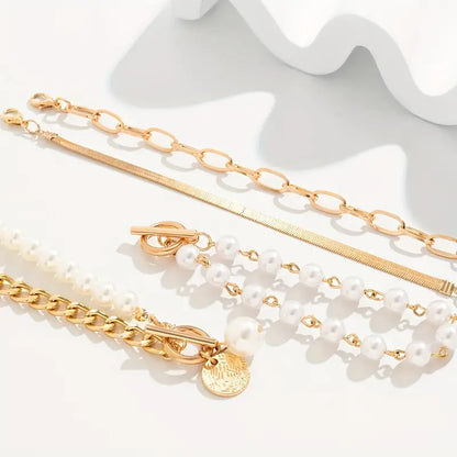 <strong>Conjunto de 4 Pulseras Chic - Serpiente, Perlas y Eslabones | Oro</strong>