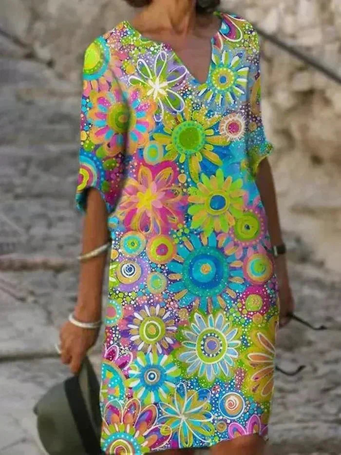 Nira | Vestido midi con flores vibrantes