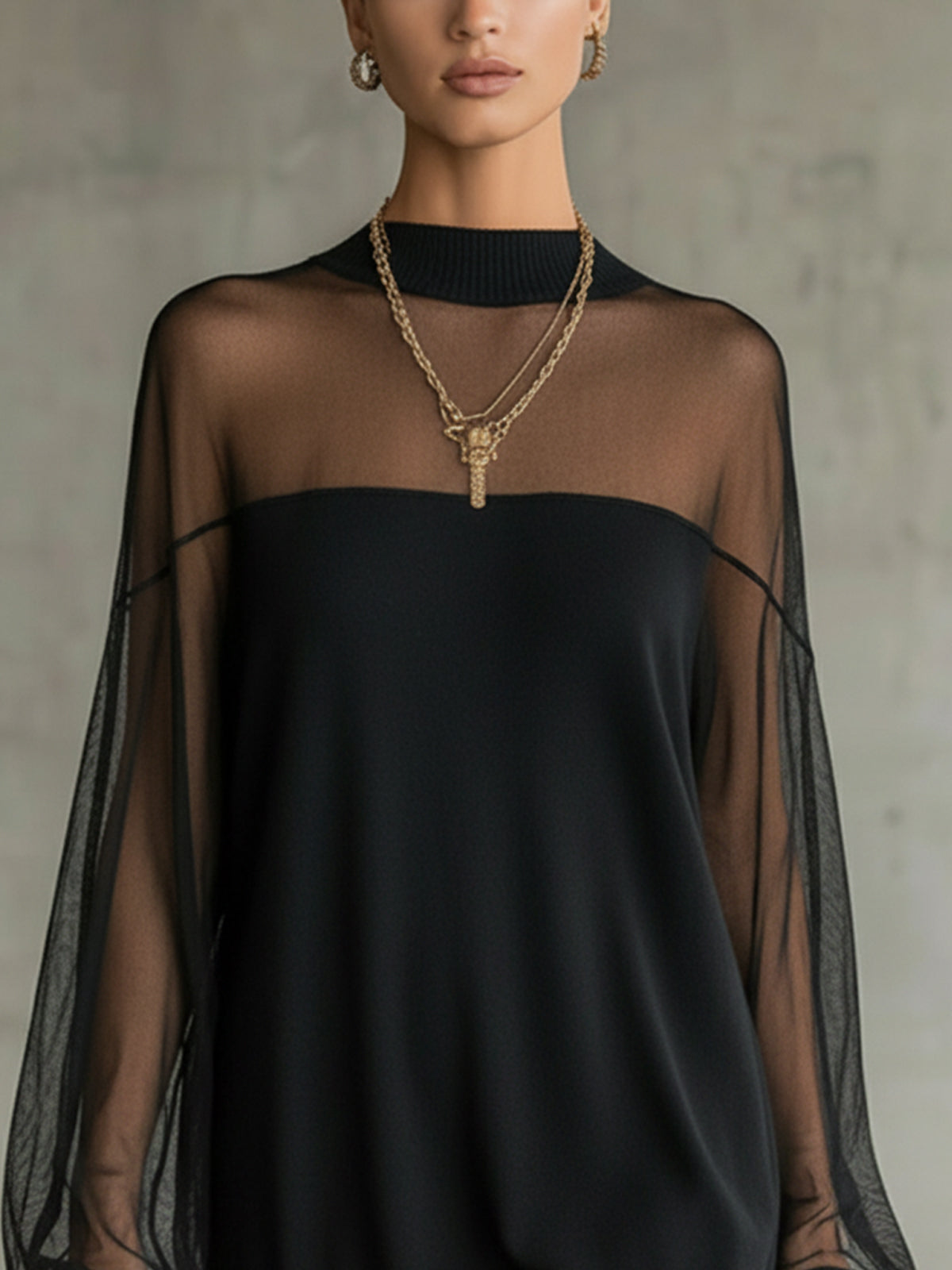 Daisy | Vestido midi negro con manga de malla y escote alto