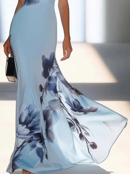 Victoria | Vestido maxi satinado con estampado en azul marino y hombros al descubierto