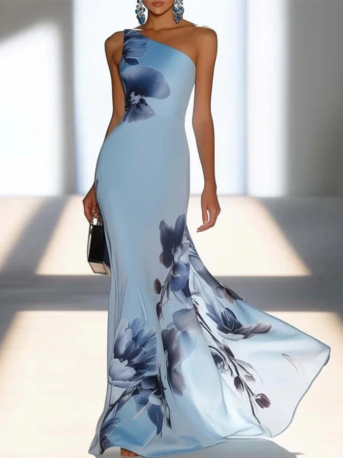 Victoria | Vestido maxi satinado con estampado en azul marino y hombros al descubierto