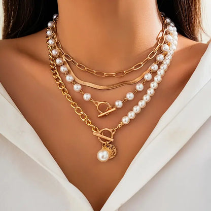 <strong>Conjunto Collar Cadena Serpiente con Perla Vintage | Oro</strong>