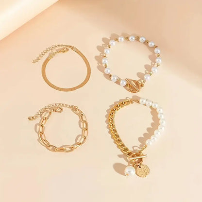 <strong>Conjunto de 4 Pulseras Chic - Serpiente, Perlas y Eslabones | Oro</strong>